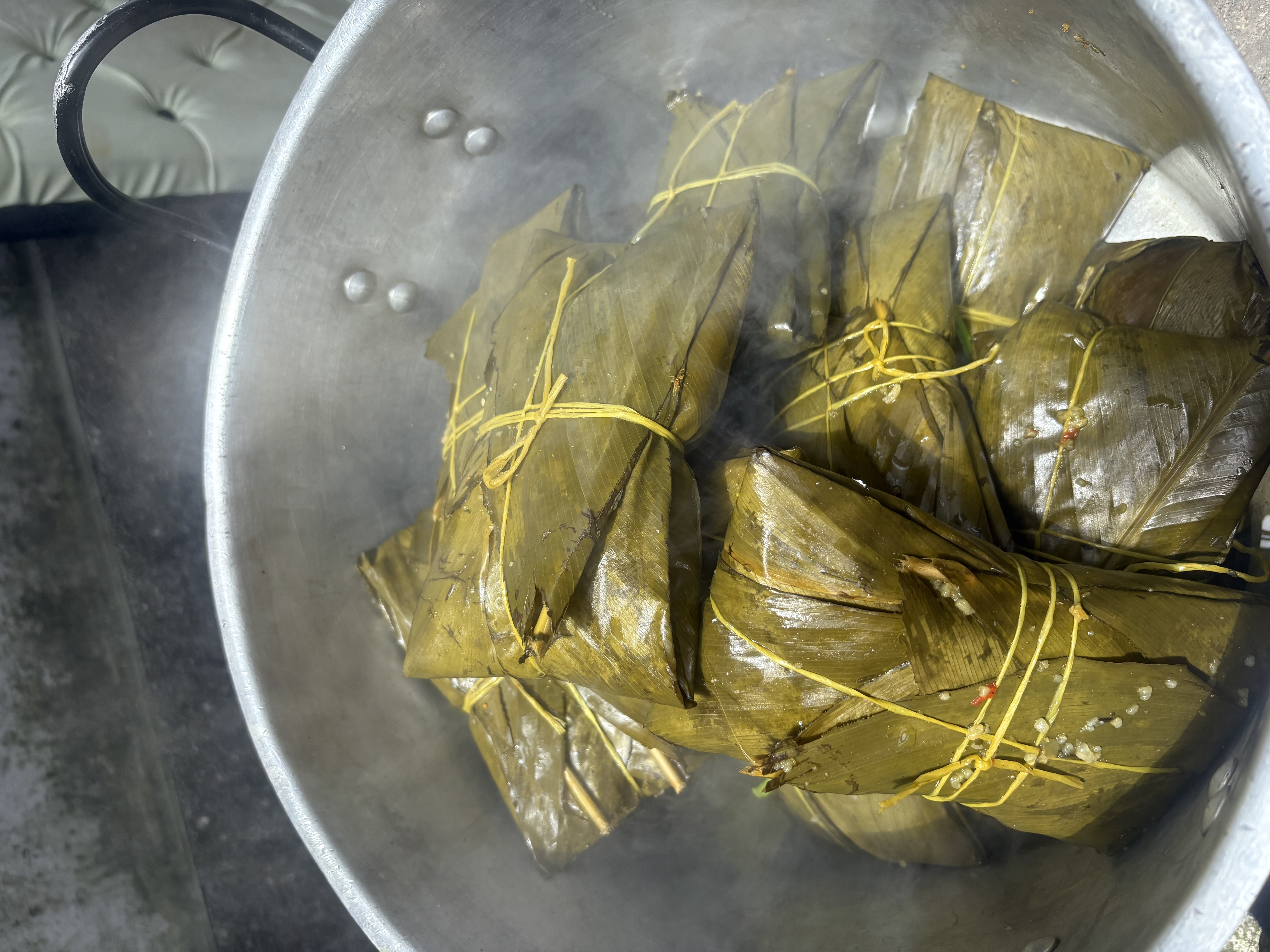 Traditional Afro-Colombian tamales steaming in a pot